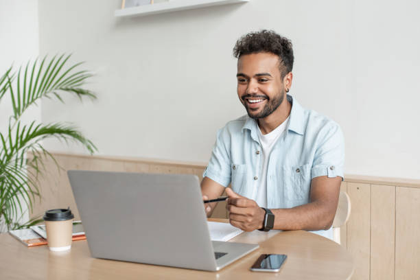 istock Young man having meeting online 1272058198