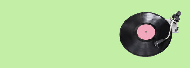 istock Abstract record player part isolated on green background. Retro music concept. 1272058279