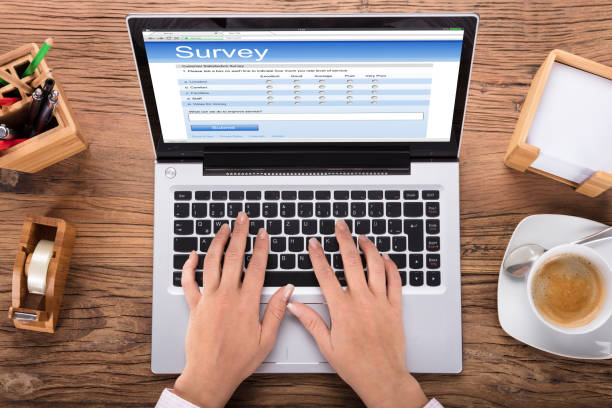 istock Businesswoman Doing Survey On Laptop 1272058562