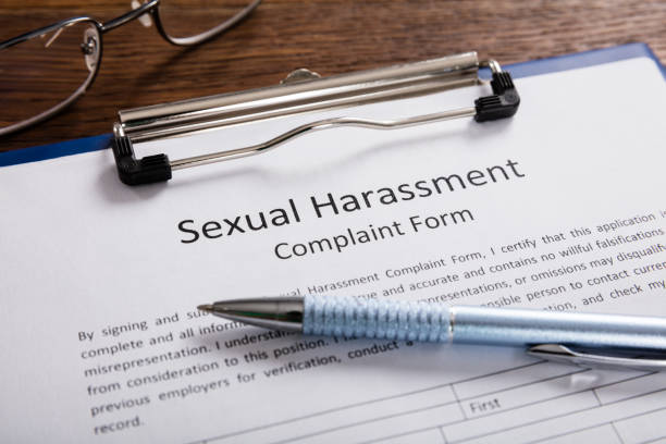 istock Sexual Harassment Complaint Form With Pen 1272058618