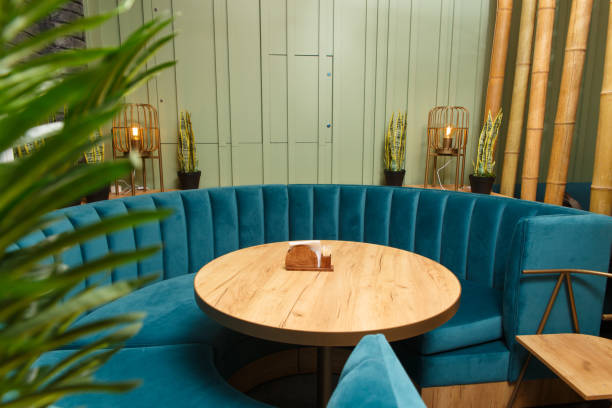 istock Large round sofa in blue for a large company 1272059578