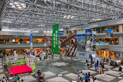People at the New Chitose Airport in Hokkaido, Japan. New Chitose Airport opened in 1991. It is the largest airport in Hokkaido.