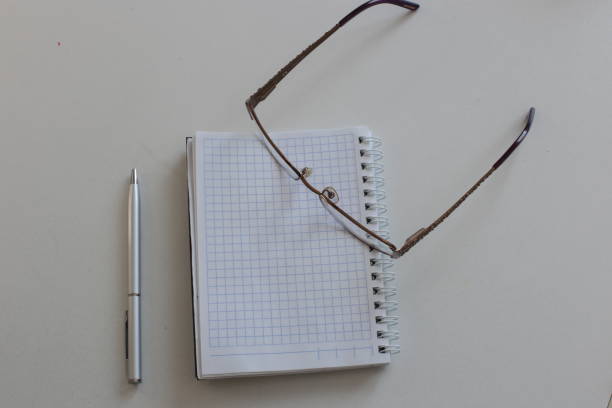 lot of open space for writing on stickers and in a notepad numbers and words on notes
