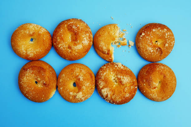 istock closeup of cookies on blue background, flat lay 1272067862