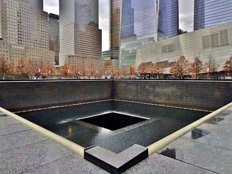 The site of the former World Trade Center towers has two large memorial fountains - Manhattan, New York City, New York, USA