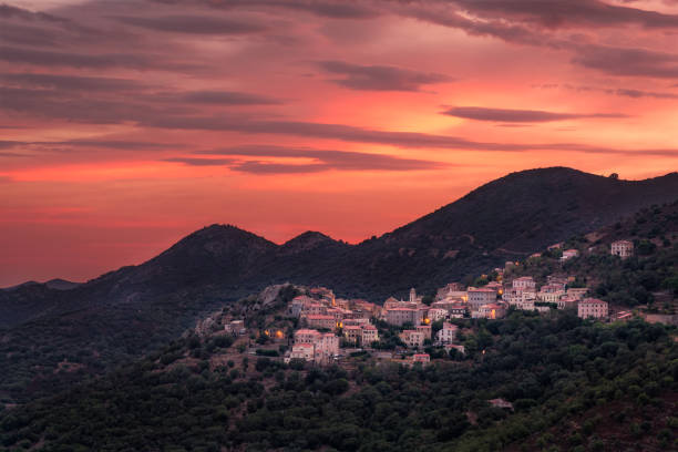istock Sunrise over Belgodere in Corsica 1272070252