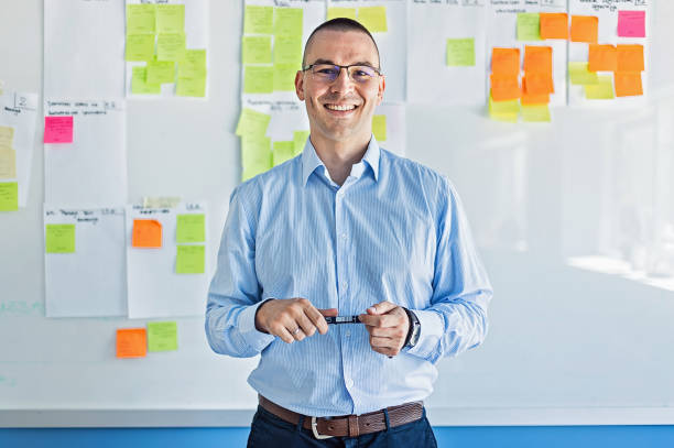 istock Businessman standing in the office 1272071228