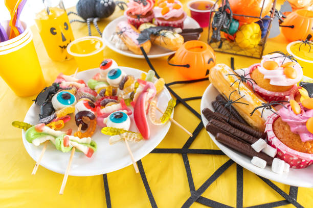 istock Halloween sweets for party. Celebrate stay home. 1272076410