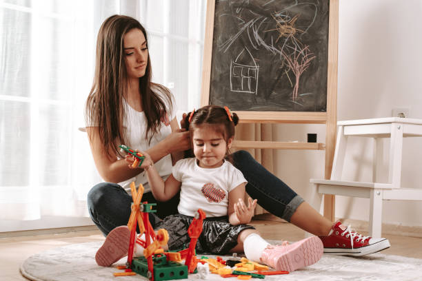 istock Mother with daughter having fun time together 1272077733