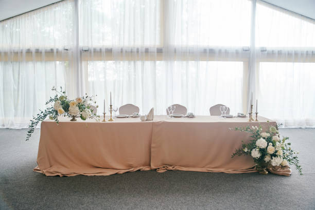 istock Wedding hall decoration in white colors. Wedding decorations 1272077864