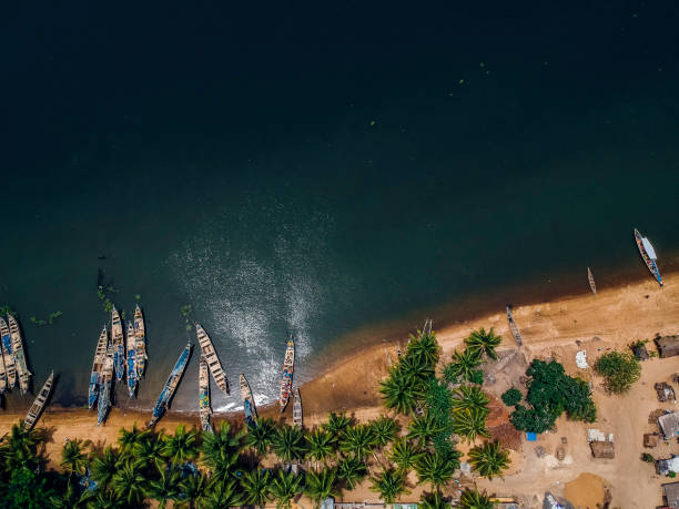 Aerial view of Ghana And aerial view of fishing boats at the shores of Ada in Ghana. west africa coast photos stock pictures, royalty-free photos & images