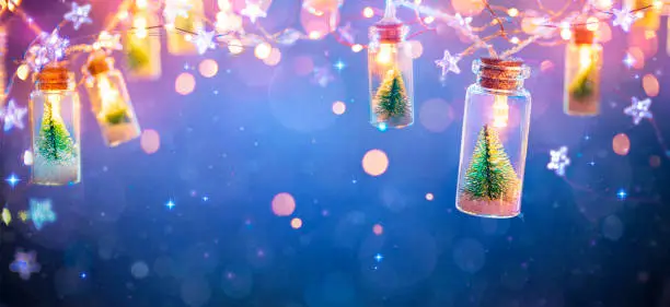 String Light With Trees In Glass Bottle Decoration - Phantom Blue Snowfall Background