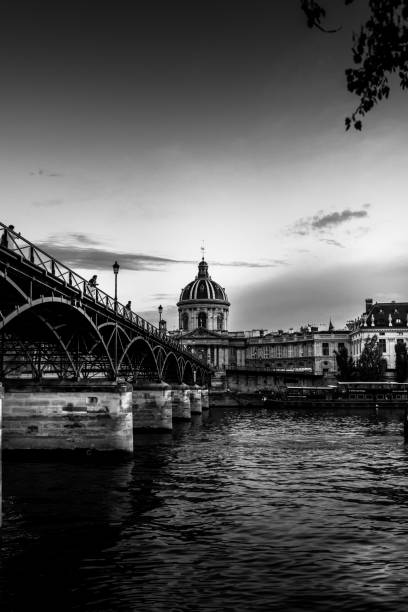 istock Paris by the river Seine at night 1272082202