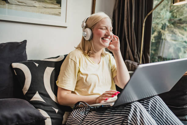 istock A young woman is using laptop at home 1272082952