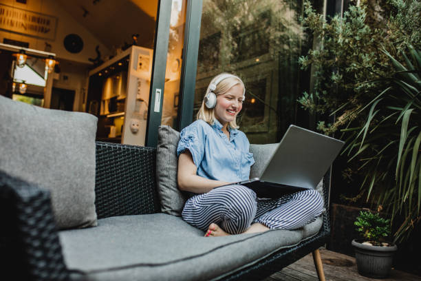 istock A young woman is working from home on the balcony 1272082989