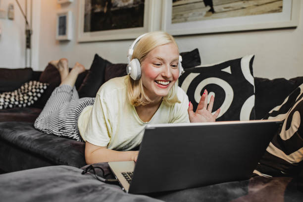 istock A young woman is using laptop at home 1272083217