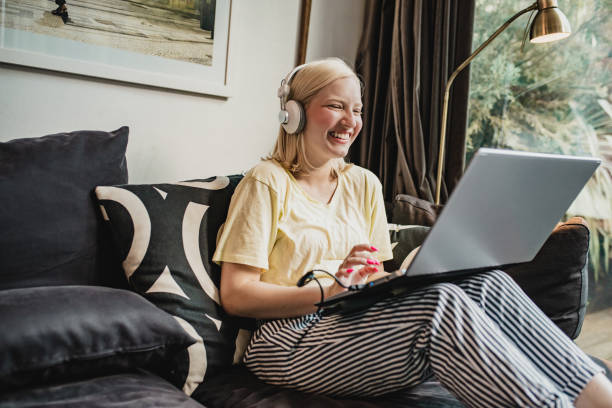 istock A young woman is using laptop at home 1272083310