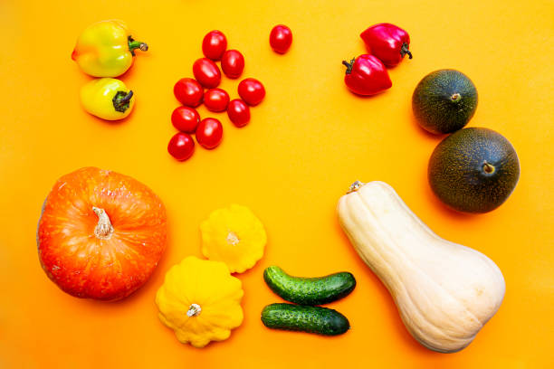 istock Harvest fresh farm vegetables on a yellow background top view. 1272084286