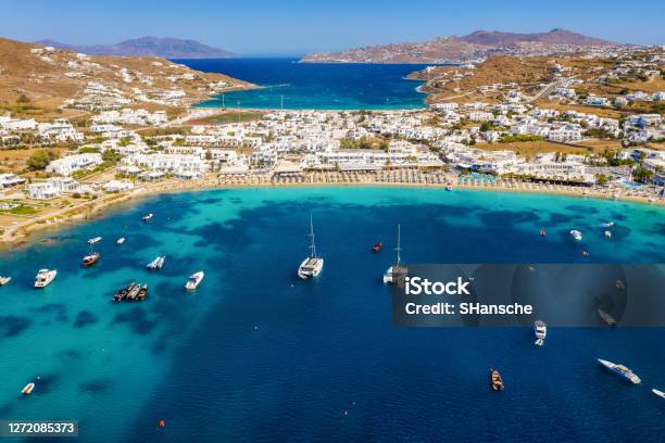 Aerial View To The Popuar Bay Of Ornos On The Island Of Mykonos Greece Stock Photo - Download Image Now