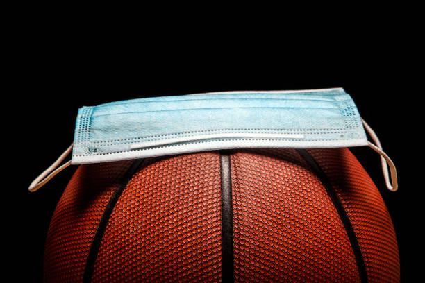 image of basketball mask dark background image of basketball mask dark background face guard sport photos stock pictures, royalty-free photos & images