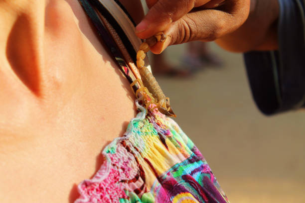 istock A man shoots a live scorpion from a woman's clothes 1272090078