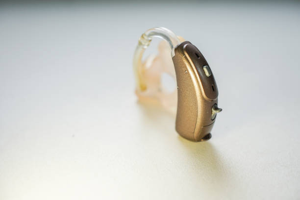 istock Hearing aid on the white background. The object is on the right. 1272091467