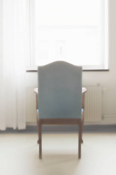 surreal room with chair an open window