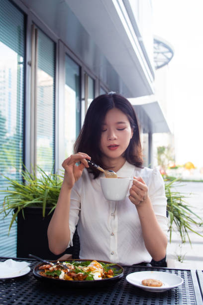 istock Young women drinking coffee 1272099815