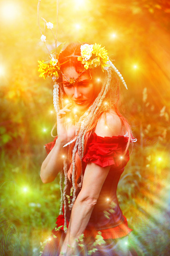 Beautiful woodland fairy and enchanted forest