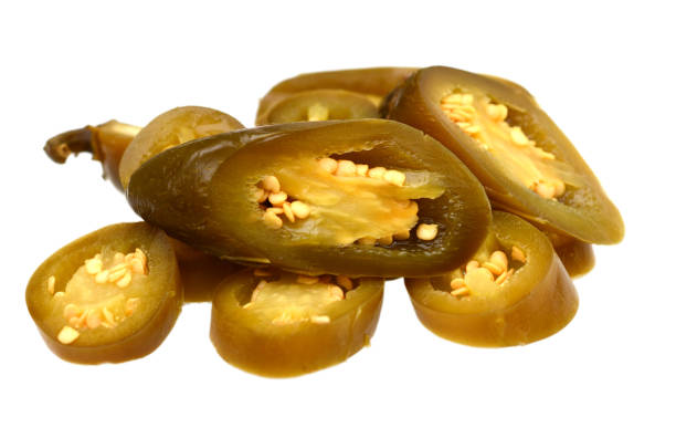 istock Sliced pickled pepper jalapeno on white 1272106343