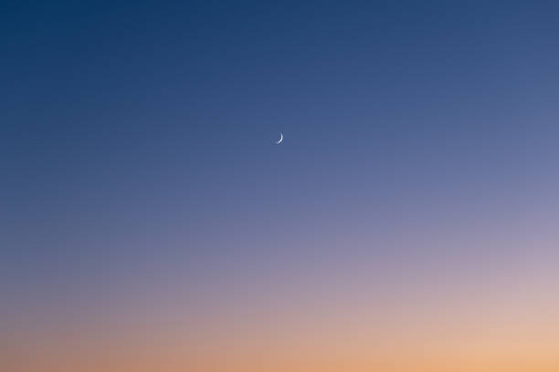istock Sky color gradient as a background. Sky with moon during sunset. Nature composition. 1272108492