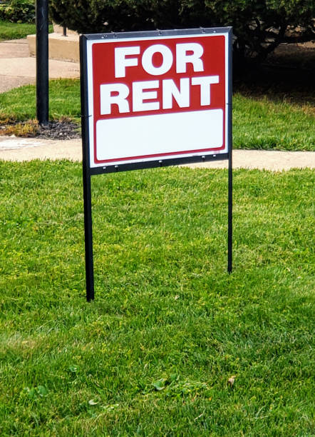 istock For Rent Sign in Grass 1272116724