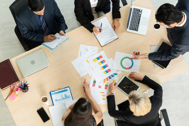 istock Business people group meeting shot from top view 1272116774