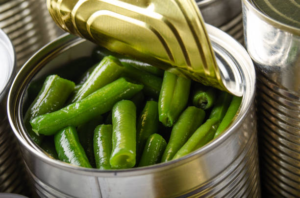 istock Canned green beans in just opened tin can. Non-perishable food 1272120744