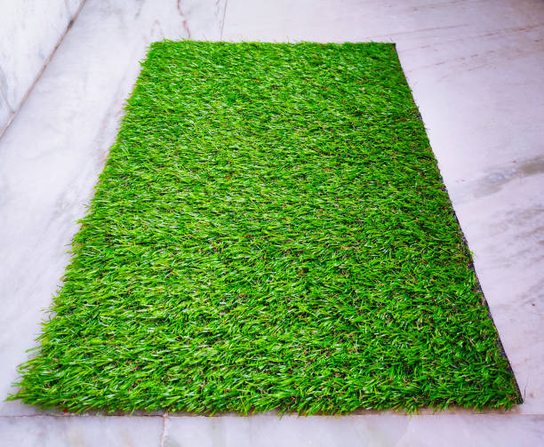 istock Green Grass Door mat, Medium size Grass type Door mat in white background, Welcome pad, Selective focus, 1272127198