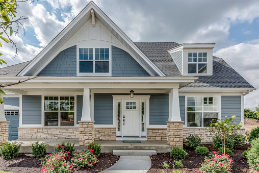 Lots of shrubs and mulch in beautifully landscaped yard