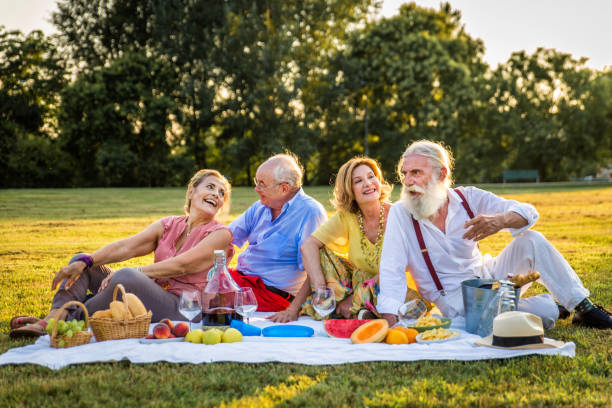 istock Group of senior people bonding outdoors 1272130863