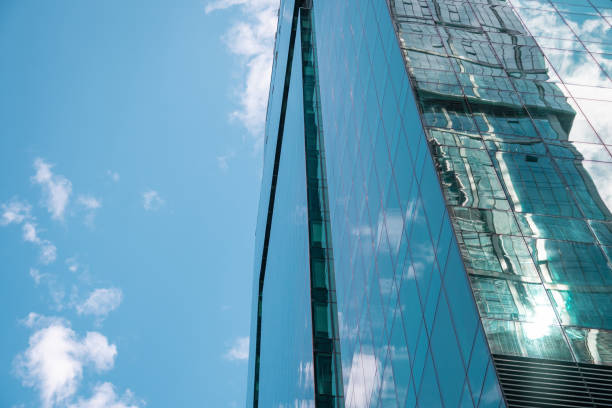 istock Skyscraper in a finance district, urban city architecture, sky cloudy background 1272131823
