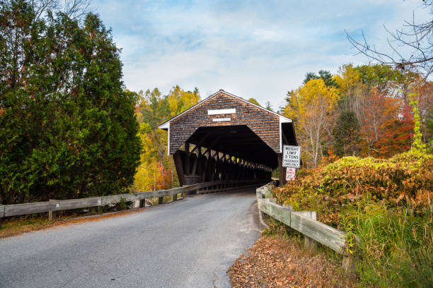 istock Empty covered bridge on a sunny autumn day 1272135030