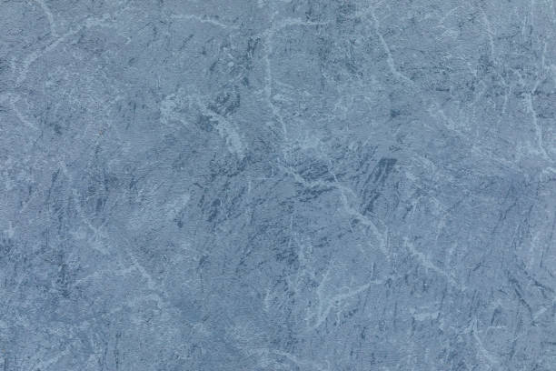 istock Gray, blue, purple and lilac painted wall texture or background 1272135835