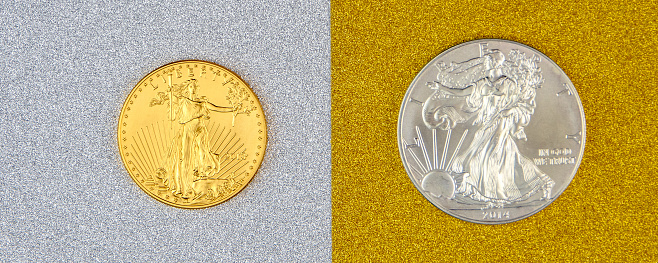 silver eagle and golden american eagle one ounce coins laying on silver and golden background, image split in two halves