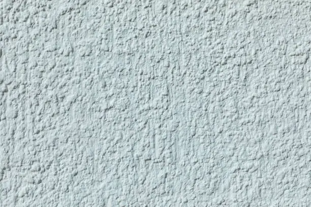 background of grey colored harmonic plaster wall