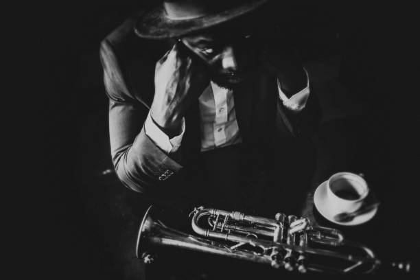 The trumpet player Trumpet, Player, vintage, dark, art, jazz, trumpet player, close-up, music, exhausted, tired, bar, passion, sadness, black people bar stock pictures, royalty-free photos & images