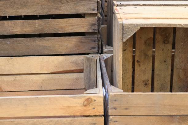 istock Very old wooden crates with some cracks in a close up view 1272146328