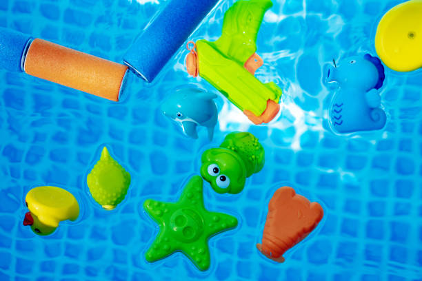istock multicolored toys in a swimming pool 1272146334