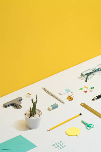 istock Stationary flat lay on yellow and white background 1272147843