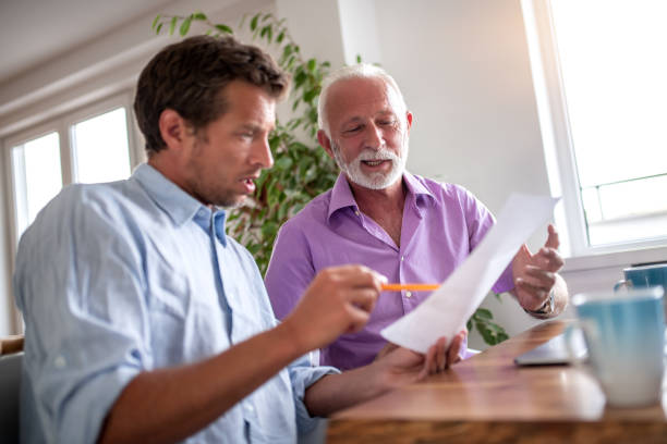 istock Two businessmen working together on new project 1272147859