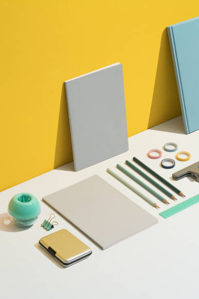istock Stationary flat lay on yellow and white background 1272150048