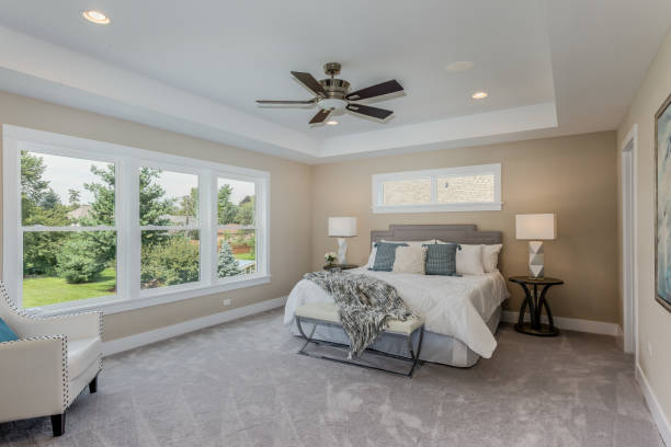 istock Bedroom with a wall full of windows 1272151350