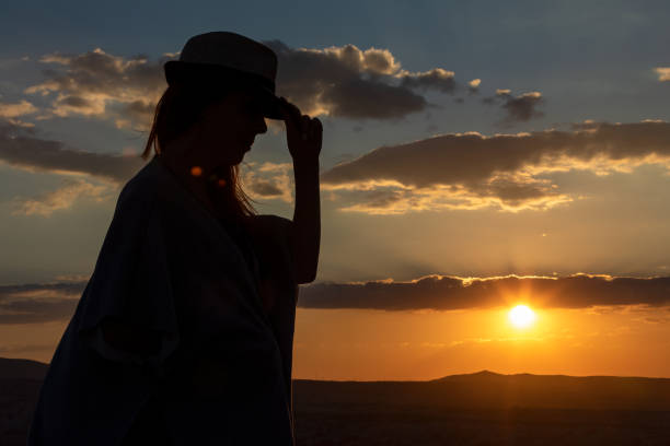 istock Woman at Cappadocia at sunset 1272154222